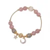 Natural Strawberry Quartz bracelet for Love & Harmony on white background
