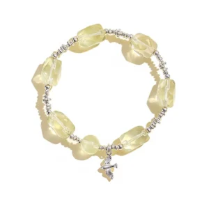 Natural Citrine bracelet for Wealth & Success with silver bird charm on white background
