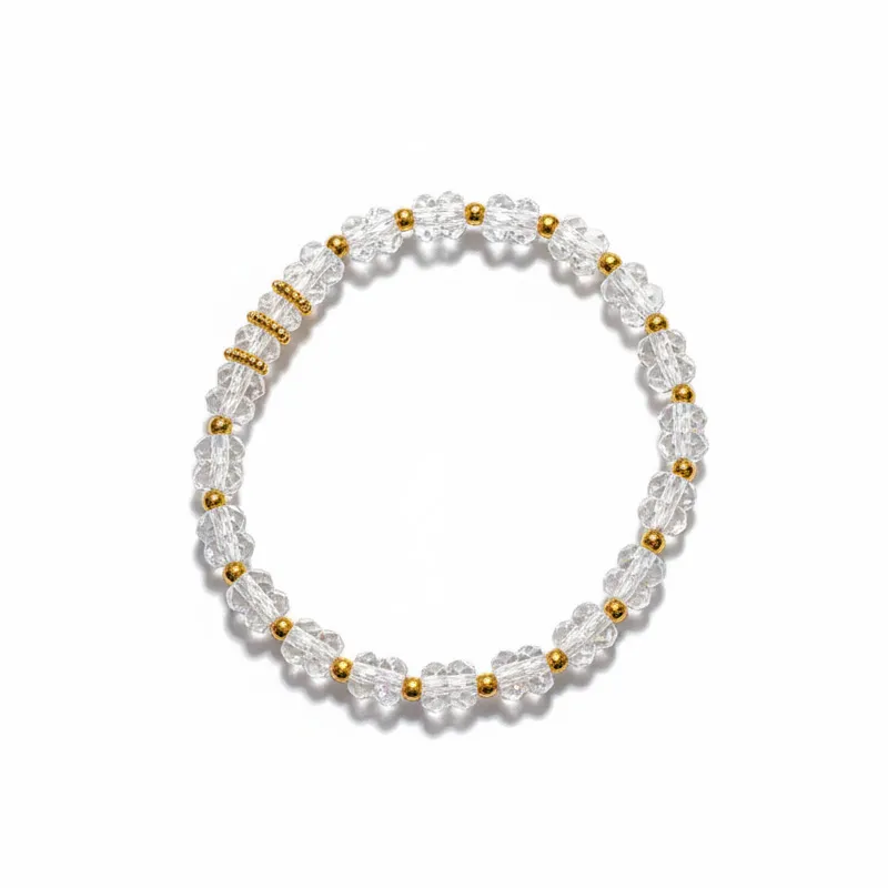 Natural Clear Quartz bracelet for Spiritual & Intuition with gold accents on white background