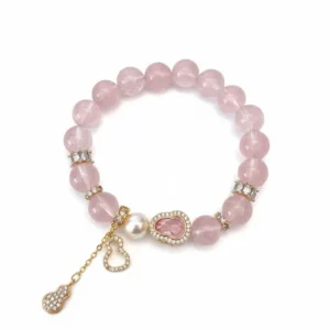 Natural Rose Quartz bracelet for Love & Harmony on white background