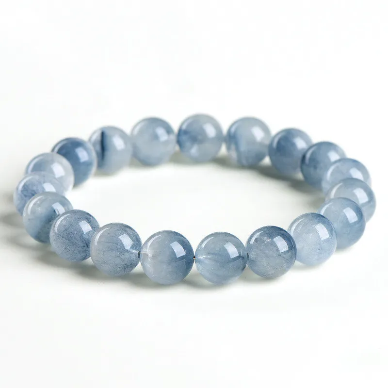 Natural Blue Rutilated Quartz bracelet for Wealth & Success on white background
