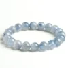 Natural Blue Rutilated Quartz bracelet for Wealth & Success on white background