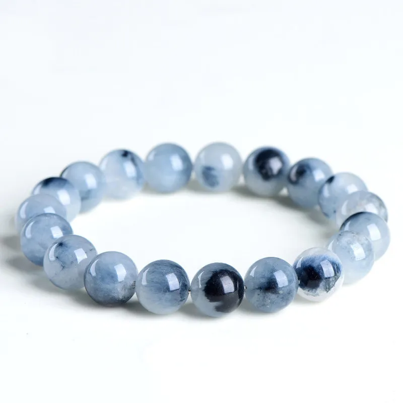 Natural Blue Rutilated Quartz bracelet for Wealth & Success on white background