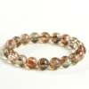 SCPBSSE1 Natural Rutilated Quartz bracelet for Wealth & Success on white background