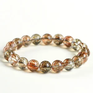 Natural Rutilated Quartz bracelet for Wealth & Success on white background