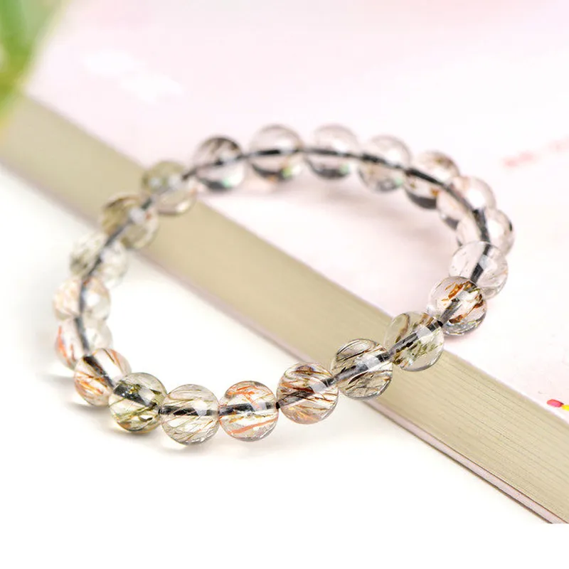 SCPBSSP2 Natural Rutilated Quartz bracelet for Wealth & Success on white background