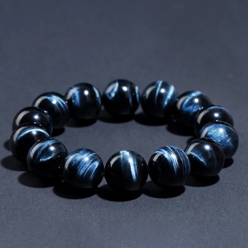 SCPBTEP1 Natural Blue Tiger's Eye bracelet for Calm & Intuition on dark grey background