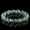 Natural Azeztulite Quartz bracelet for Spiritual & Intuition on black reflective background