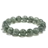 SCPGRU02P1 Natural Green Rutilated Quartz bracelet for Wealth & Success with dark needle inclusions on white background