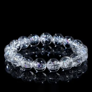 Natural Clear Quartz bracelet for Spiritual & Intuition on black reflective background
