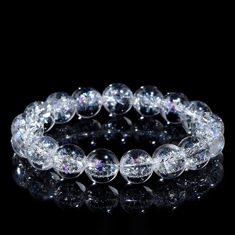 Natural Clear Quartz bracelet for Spiritual & Intuition on black reflective background