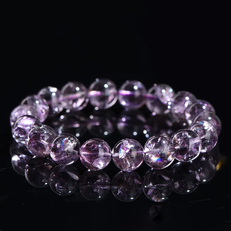 Natural Azeztulite Quartz bracelet for Spiritual & Intuition on reflective black background