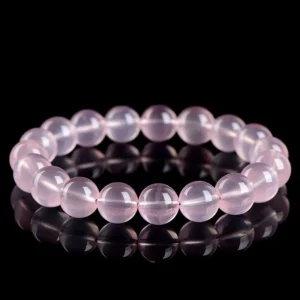 Natural Rose Quartz bracelet for Love & Harmony on black background