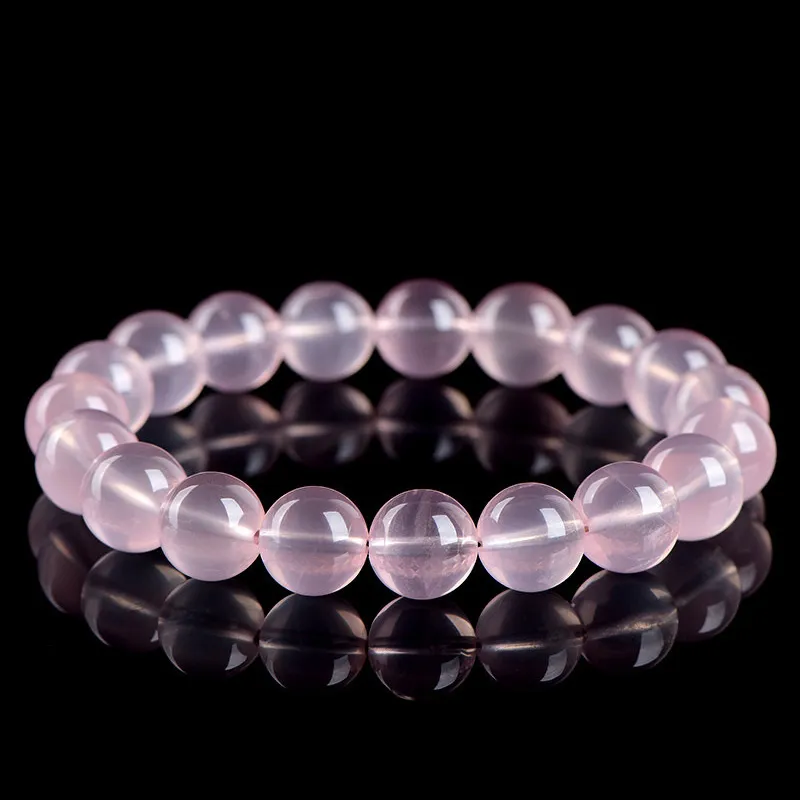 Natural Rose Quartz bracelet for Love & Harmony on black background