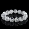 Natural Clear Quartz bracelet for Spiritual & Intuition on black reflective background