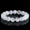 Natural Clear Quartz bracelet for Spiritual & Intuition on black reflective background