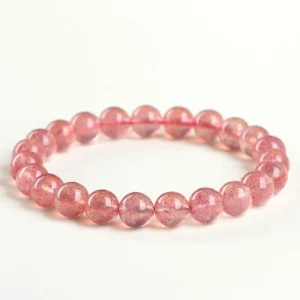 Natural Strawberry Quartz bracelet for Love & Harmony on white background