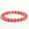 SCPST02E1 Natural Strawberry Quartz bracelet for Love & Harmony on white background