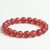 Natural Strawberry Quartz bracelet for Love & Harmony on white background